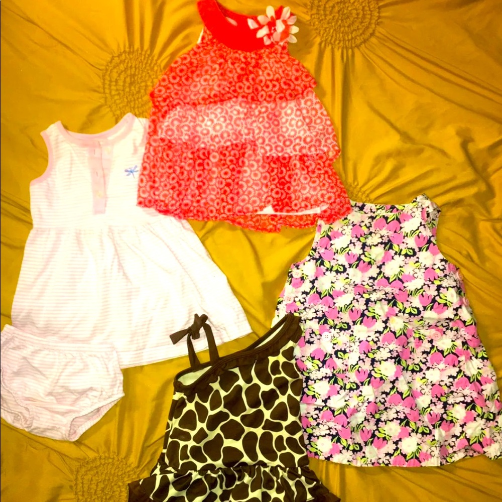 12-18 month dresses and bathing suit.